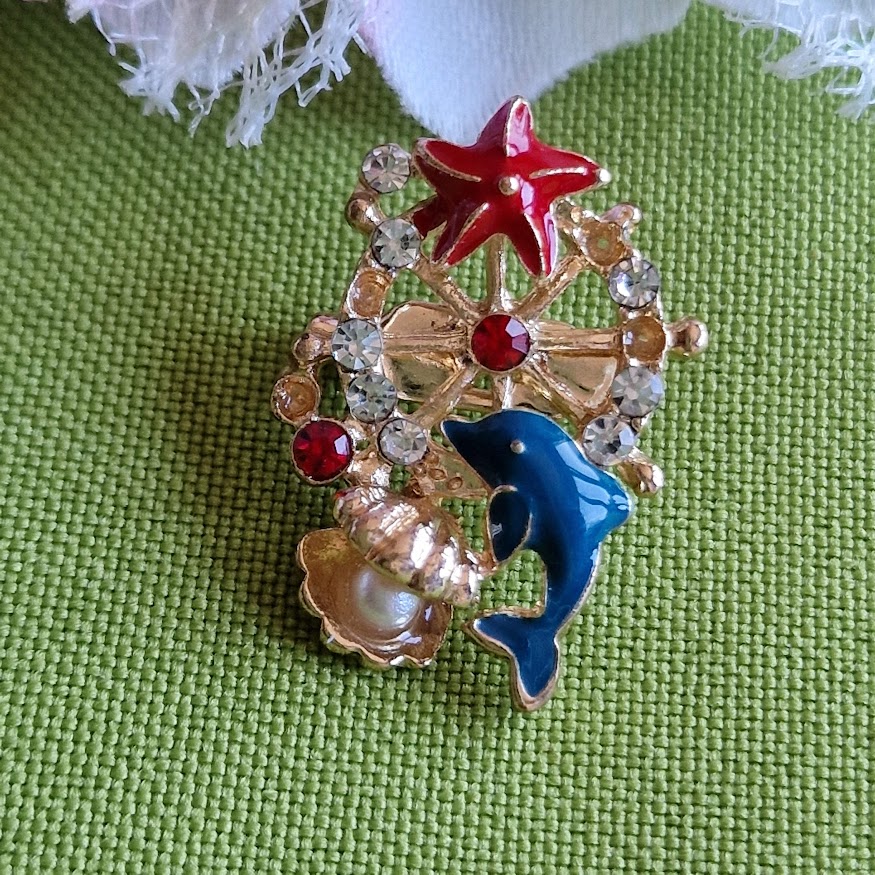 Kitűző bross BRO372 - Tenger szerelmesei kék delfin melltű 19x28mm