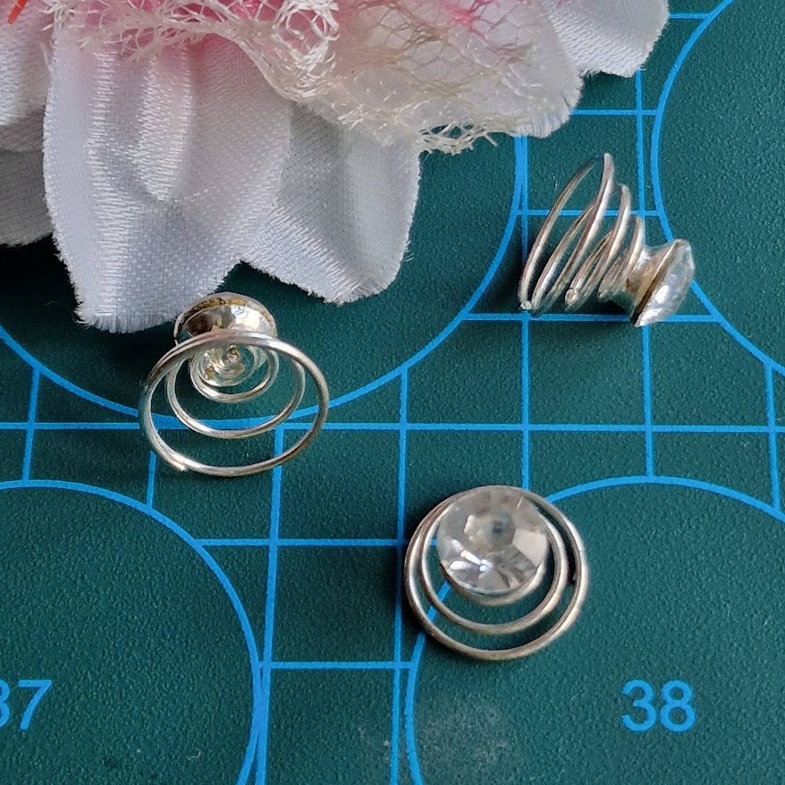 ESKÜVŐ HAD206 - Kristályköves virág alakú hajrugó csavaros hajdísz